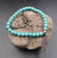 Bracelet en Howlite Turquoise + breloque plume Amérindienne