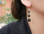 Boucles d'oreilles pendantes 3 boules en Onyx