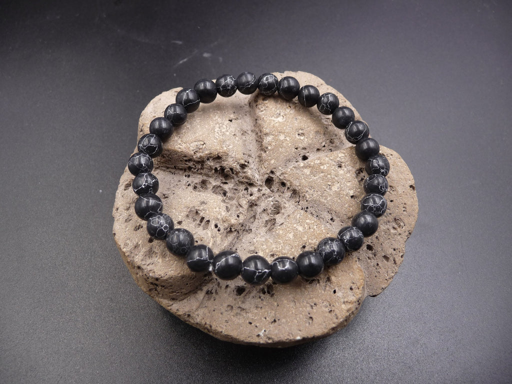 Bracelet Lithothérapie en Howlite noire 6 mm- Ancrage, relaxation