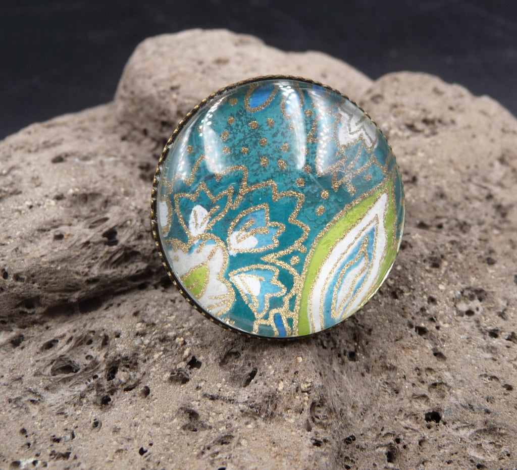 Bague originale motif fleurs cabochon en verre