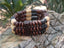 Bracelet mixte triple rang de perles en bois marron, noir et beige