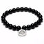 Bracelet Mala Tibétain en Onyx naturel 8 mm et breloque Lotus